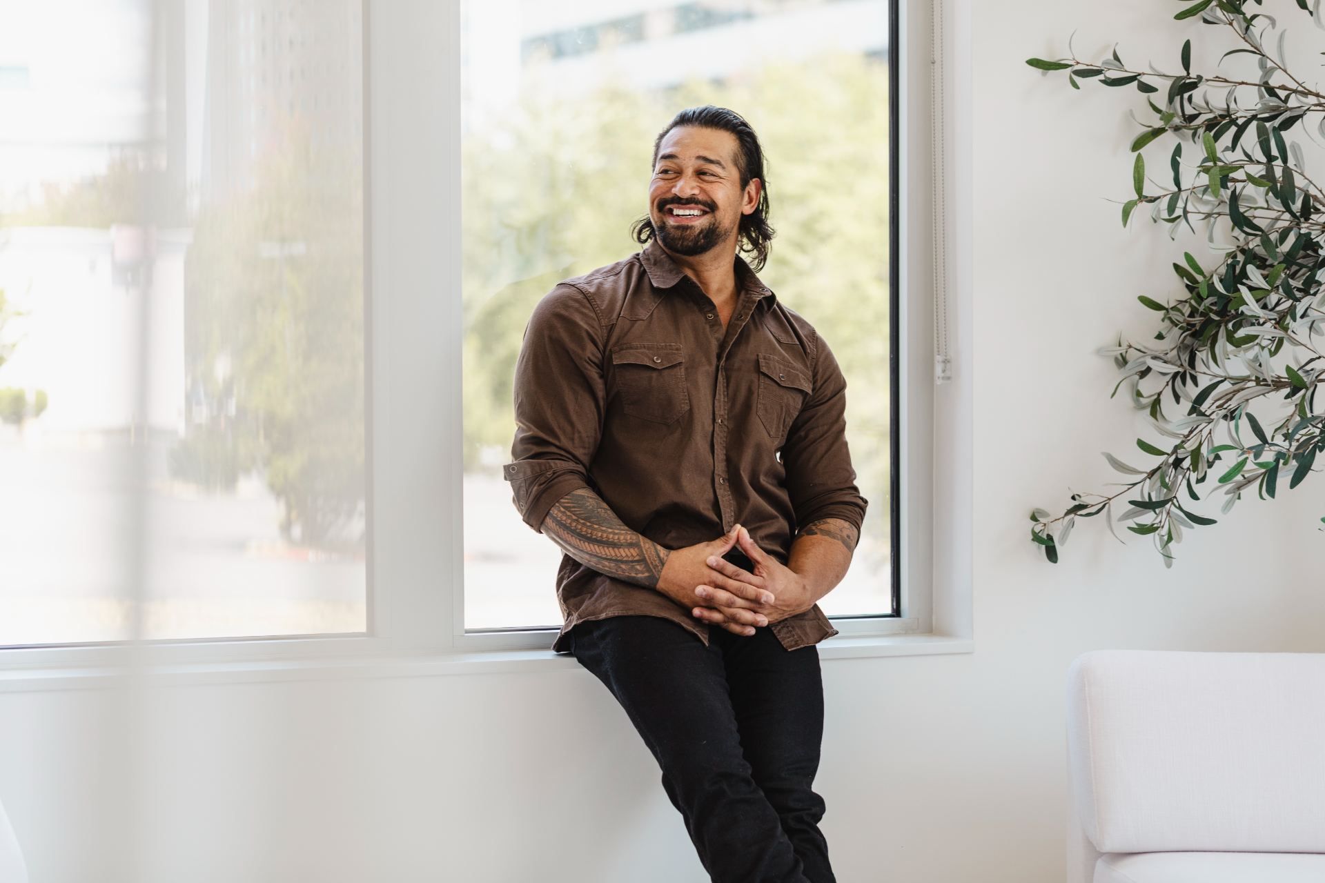 A smiling patient at the Advanced Hair Restoration clinic